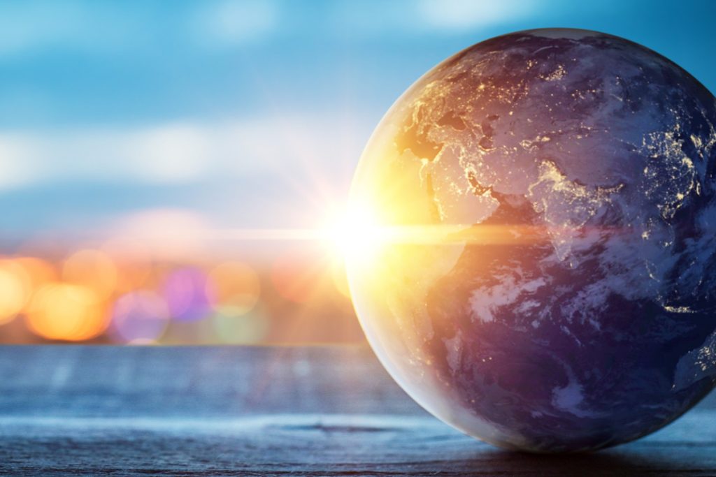 Earth with sunrise and blurred background